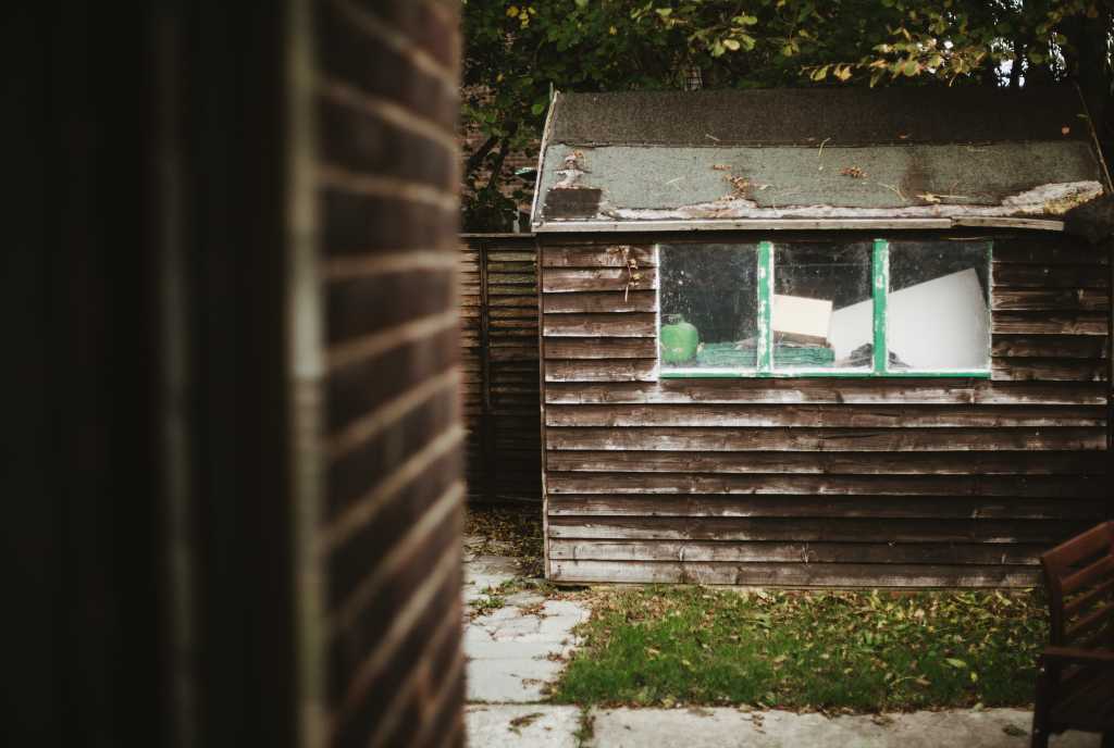 messy & unorganised garden shed